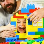Dad and Son playing with Legos