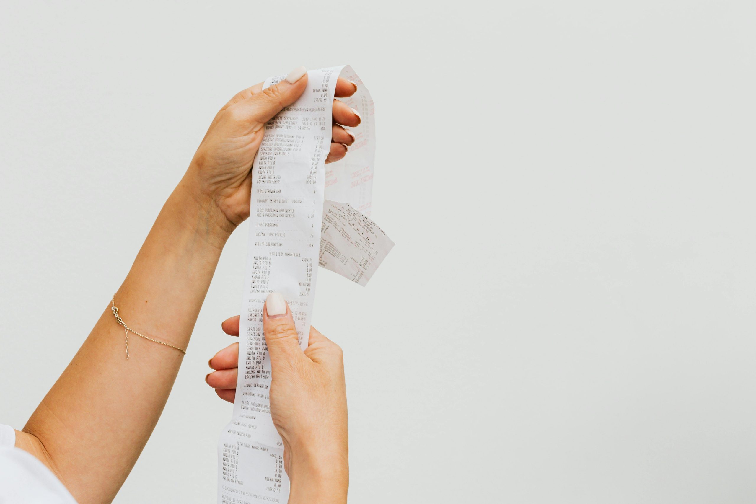 Why Your Receipt Is 3 Feet Long: The Truth Behind Grocery Loyalty Programs