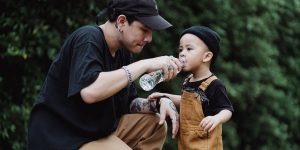 baby drinking bottled water