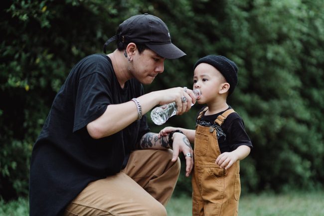 baby drinking bottled water