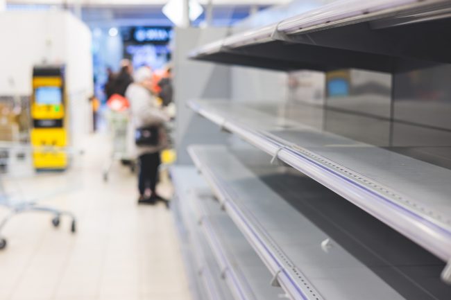 View of empty supermarket shelves, grocery store work stoppage closes, sanctions and embargo, panic buying with supplies and goods shortage, food crisis and deficit concept Kroger snacks