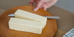 What Explains the Price Difference in Butter Between Iowa and Illinois?