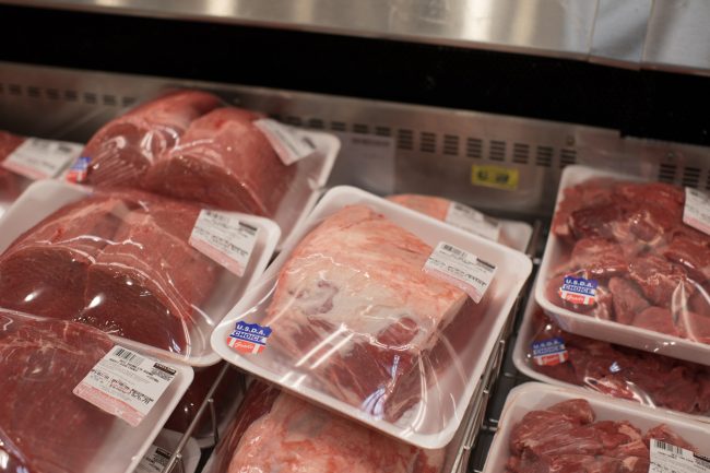 Costco wholesale warehouse shopping aisle for meats, a members only club. in Portland Oregon expired meat