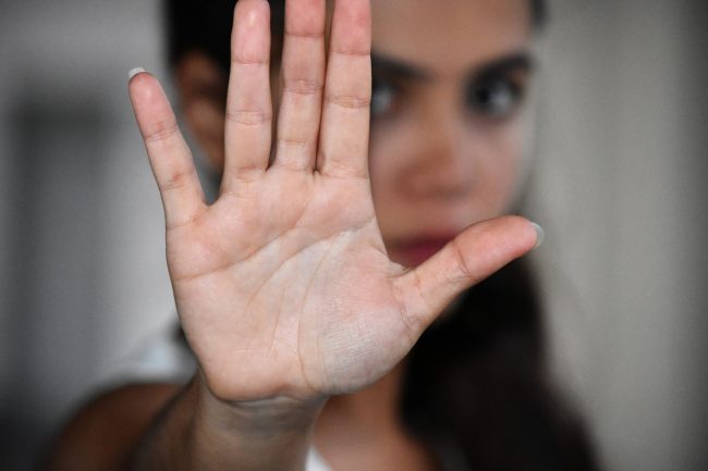 Female Gesturing Stop The 8 Worst Places to Use a Coupon