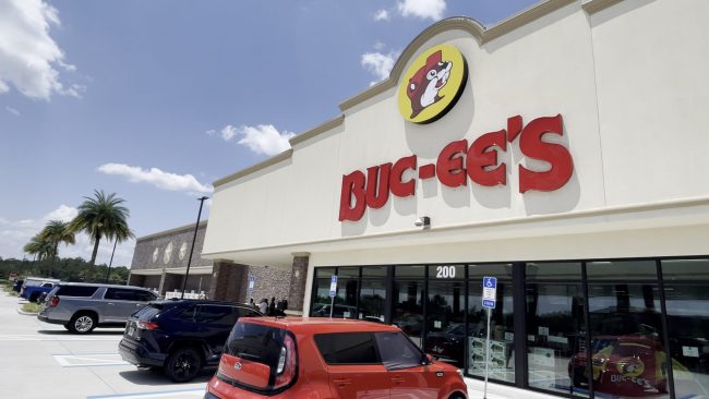 Buc-ee’s retail store front building sign and people 5. Regional and Specialty Snacks