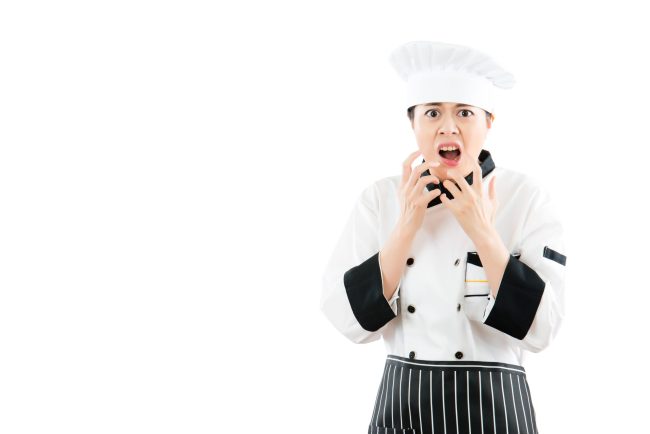 angry cook woman feel crazy and shouting 7 Foods That Instantly Tell Workers You Have No Idea How to Cook