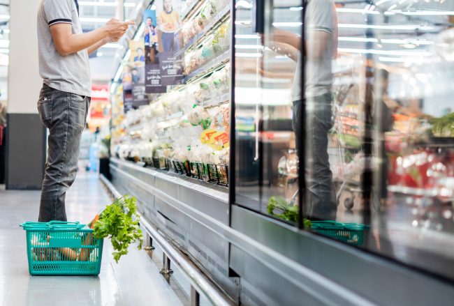 Men standing choose products in supermarkets, ready-to-eat food, grocery store music