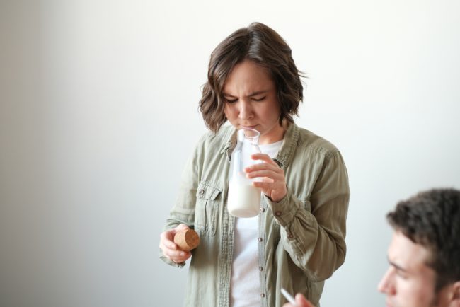 Photo,Of,Young,Couple,Enjoying,Having,Breakfast,Together.,Girl,Checks expiration date