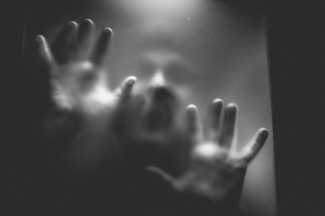 Scary,Picture,Of,Hands,Behind,Glass Grocery Stores That Locals Swear Are Haunted After Closing