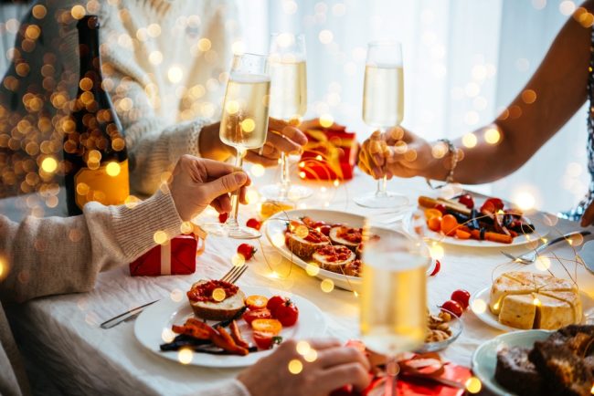 Friends,Celebrating,Christmas,Or,New,Year’s,Eve,With,Sparkling,Wine frozen food