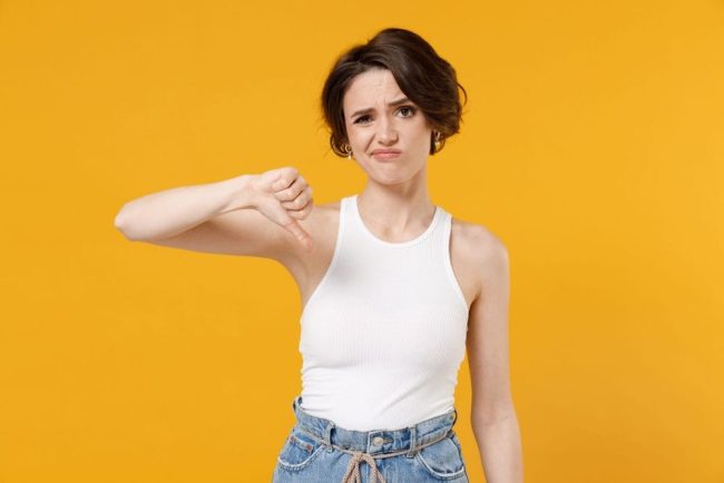 Young,Displeased,Dissatisfied,Sad,Woman,20s,With,Bob,Haircut,Wear 9 Times You Think You’re Getting a Discount—But You’re Not