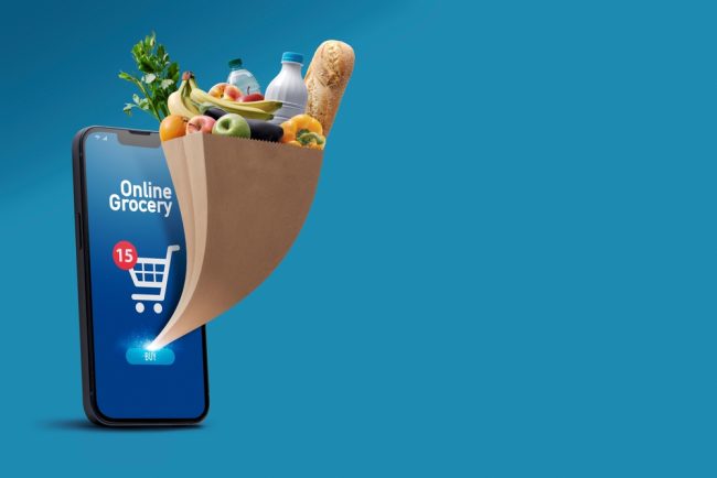 Online,Grocery,App,On,Smartphone,And,Full,Grocery,Bag,Coming Grocery app