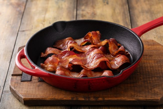 Crispy,Bacon,In,A,Cast,Iron,Skillet,Cooked,And,Ready bacon
