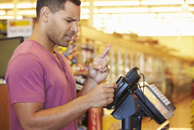 Hopeful,Customer,Paying,For,Shopping,At,Checkout,With,Card,Crossing $200 grocery challenge