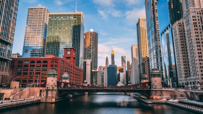 The Chicago skyline along the Chicago River. 7 App-Only Grocery Prices Illinois Shoppers May Soon Access Offline
