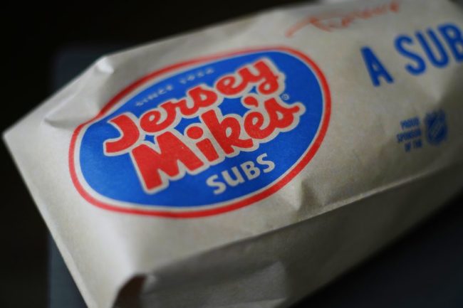 A close-up view of a branded Jersey Mike’s Subs paper bag. Jersey Mike’s Brought Back the Sandwich Fans Wanted Permanently — But Only for a Limited Time